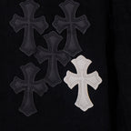 Black denim with multiple cross appliques, including one white cross