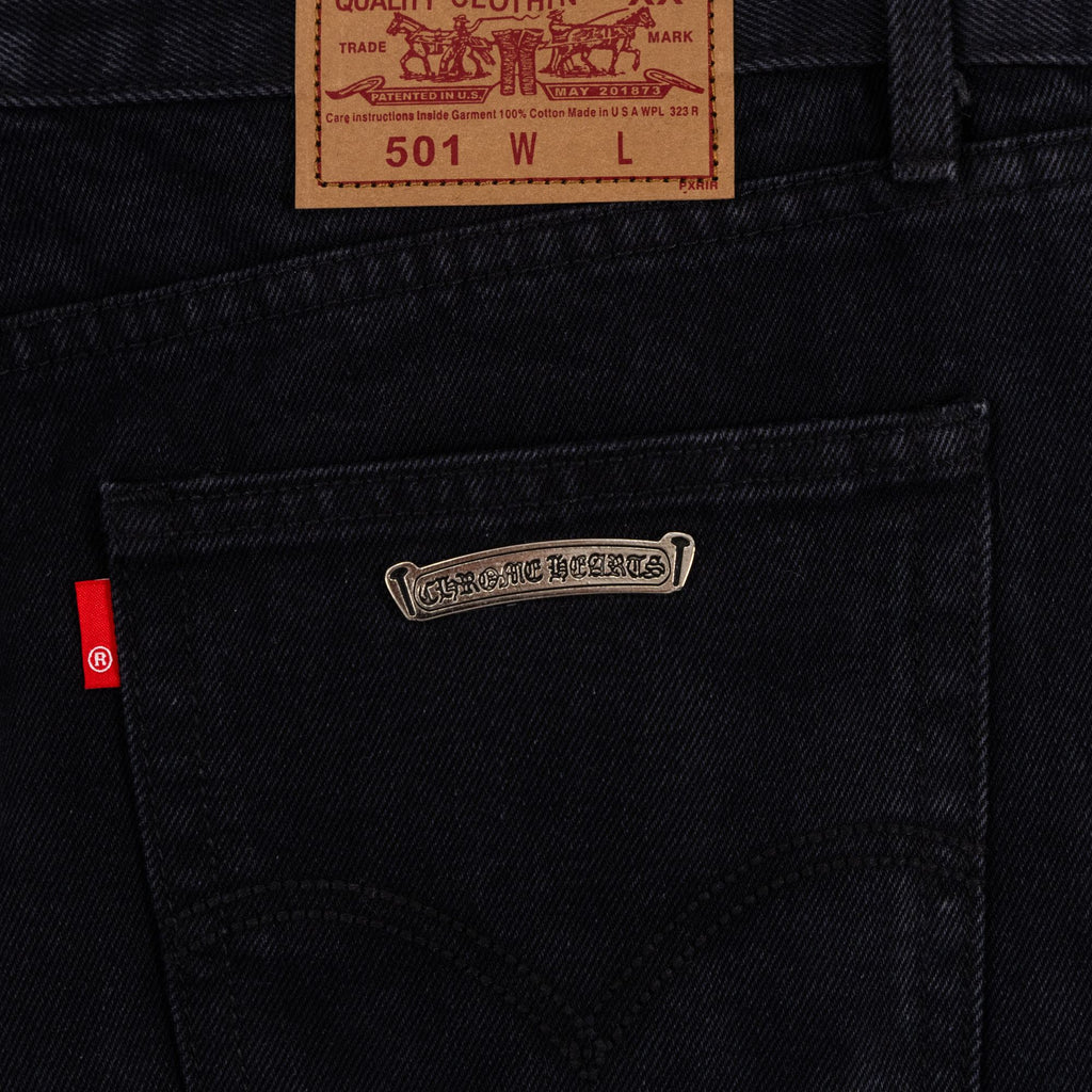 Black denim Chrome pants back pocket with small logo patch
