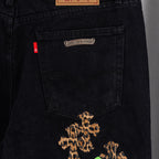 Black denim Chrome pants with leopard graphic on front pocket