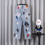Light blue denim pants with cross applique patches on back