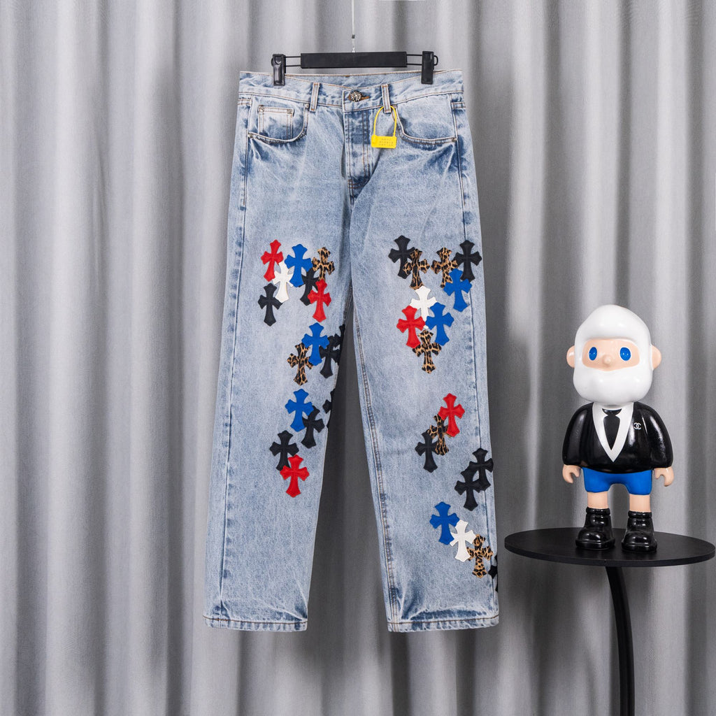 Light blue denim pants with colorful cross applique on legs