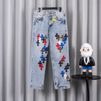 Light blue denim pants with colorful cross applique on legs