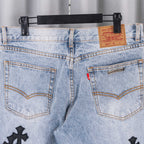 Light wash denim pants with dual pockets and Levi Strauss leather patch