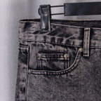 Chrome pants back close-up: gray denim waistband with belt loops and back pocket