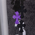 Chrome pants in dark denim with purple and black cross patches on leg