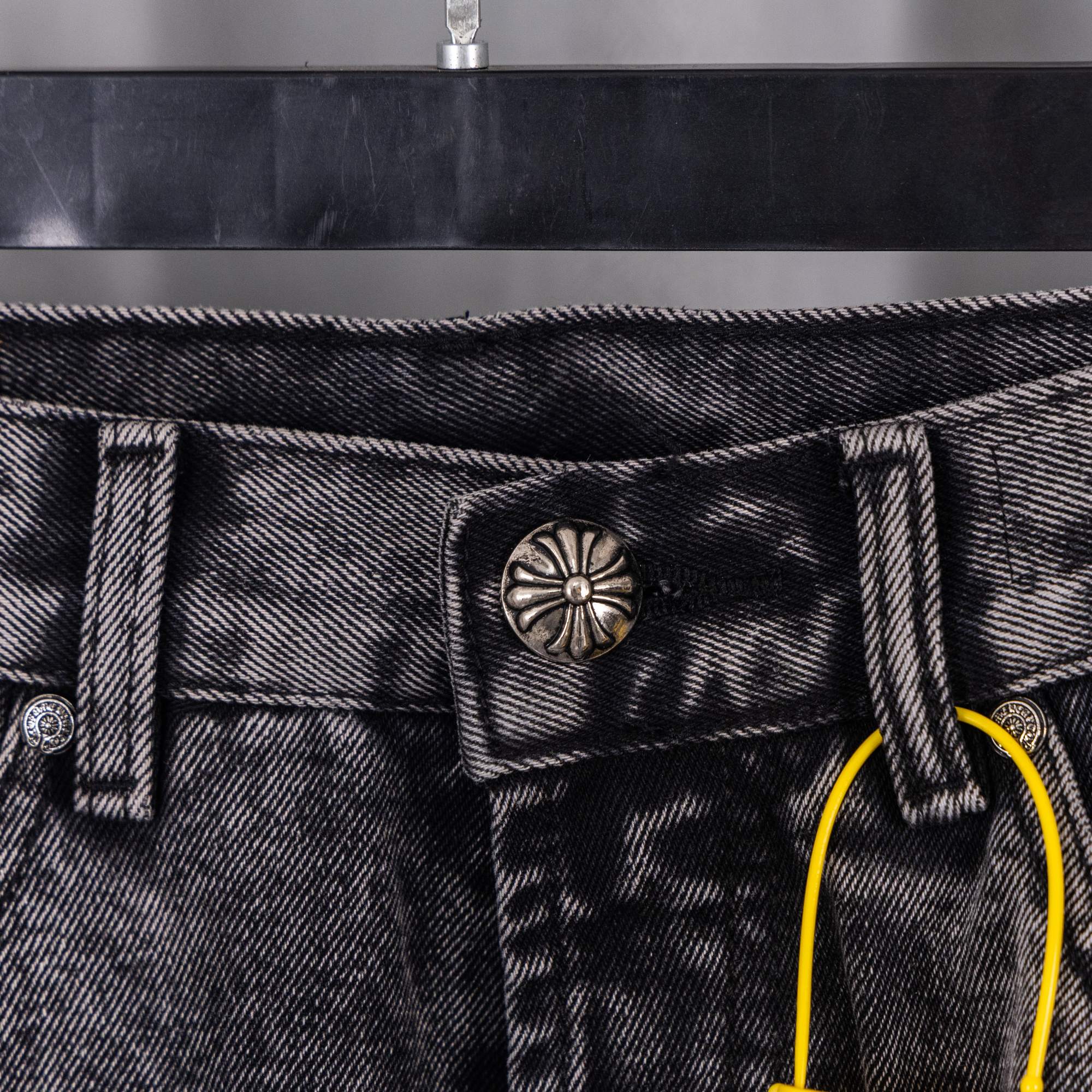 Chrome pants in dark denim with button closure and belt loops at waistband