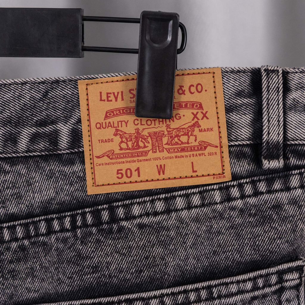 Levi's care label on denim waistband, size 501 W.