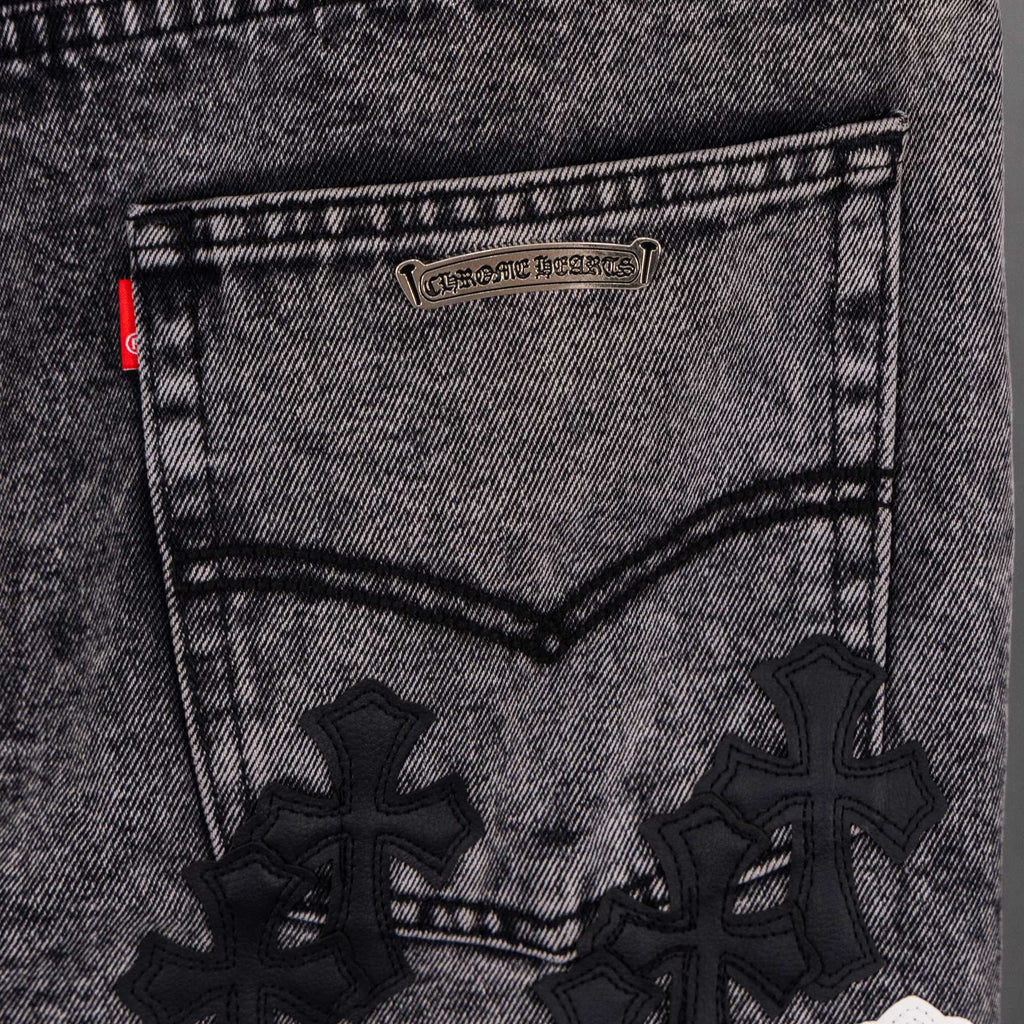 Chrome pants denim back pocket with small label and black cross patches