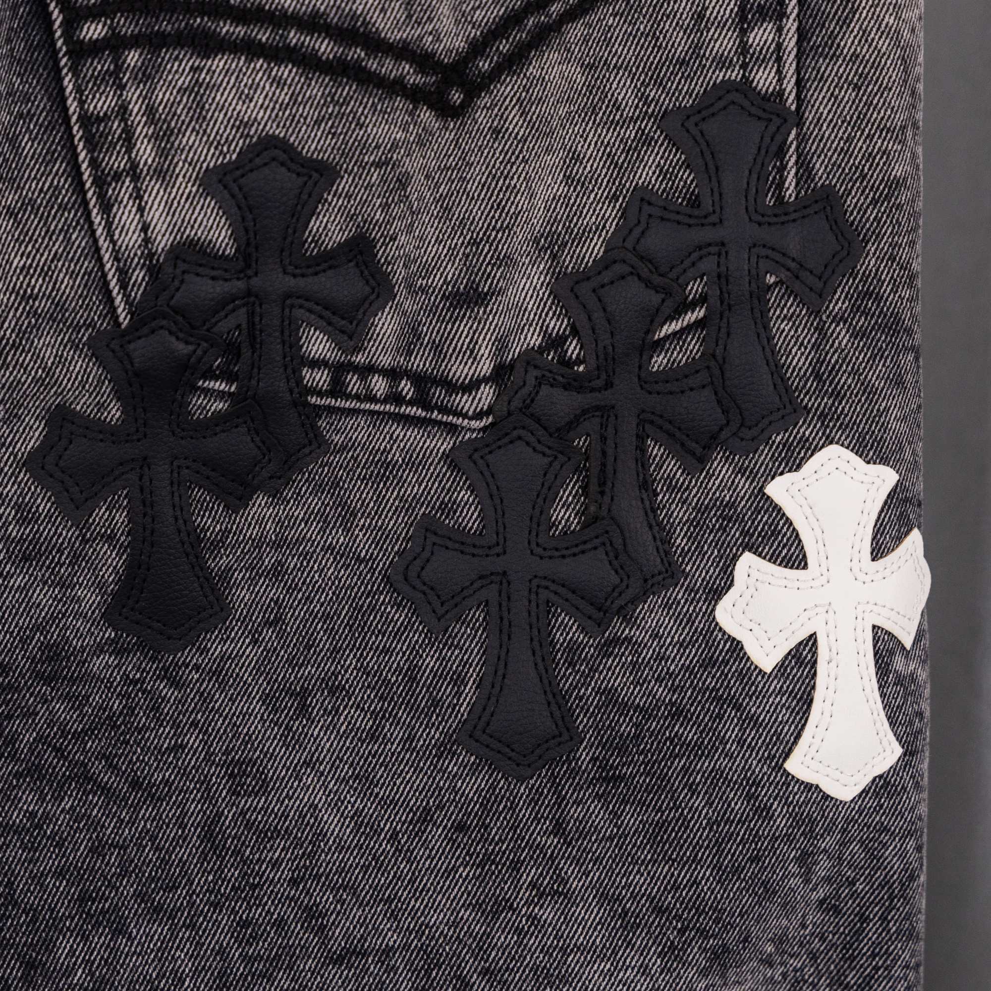 Chrome pants denim with black cross patches and one white cross applique