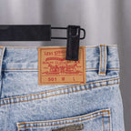 Light blue denim pants with Levi Strauss & Co label and quality clothing tag