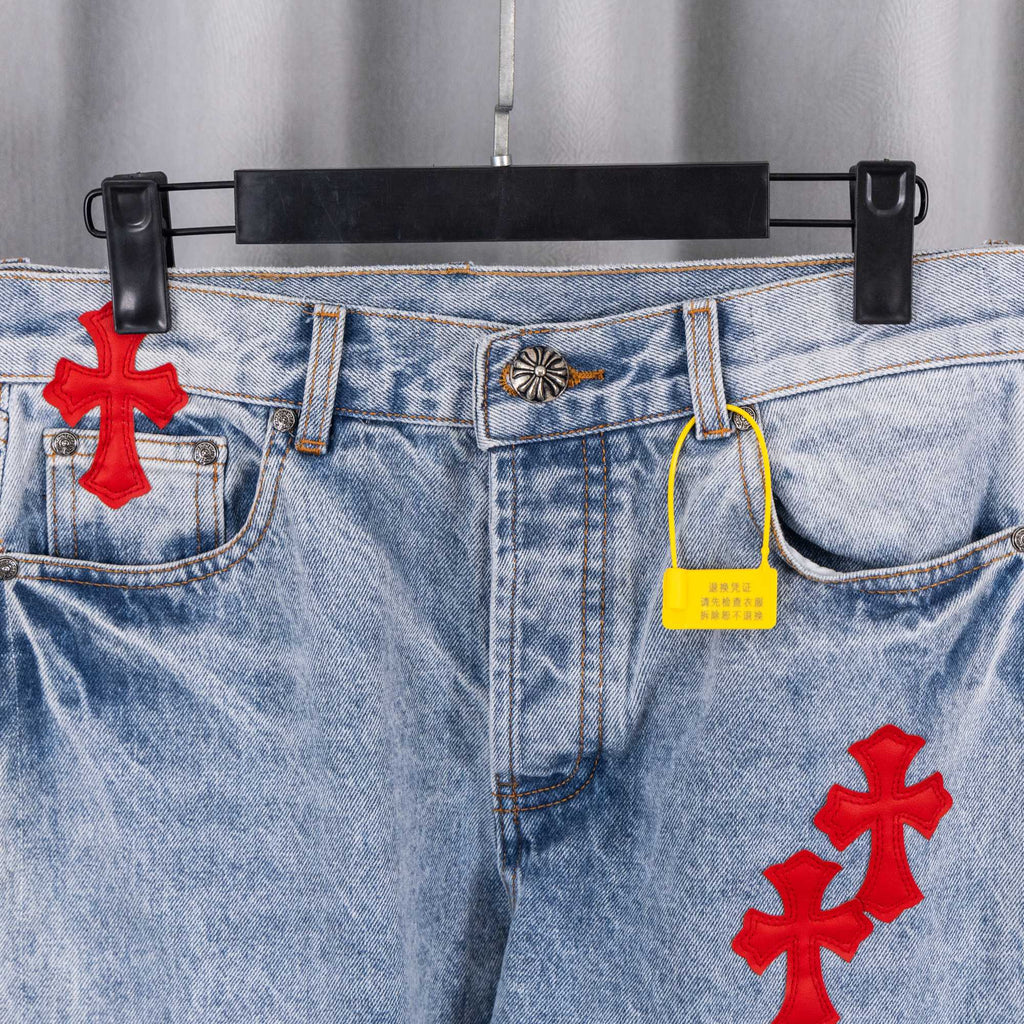 Light blue denim pants pocket area with red cross patch and coin pocket