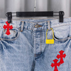 Light blue denim pants pocket area with red cross patch and coin pocket