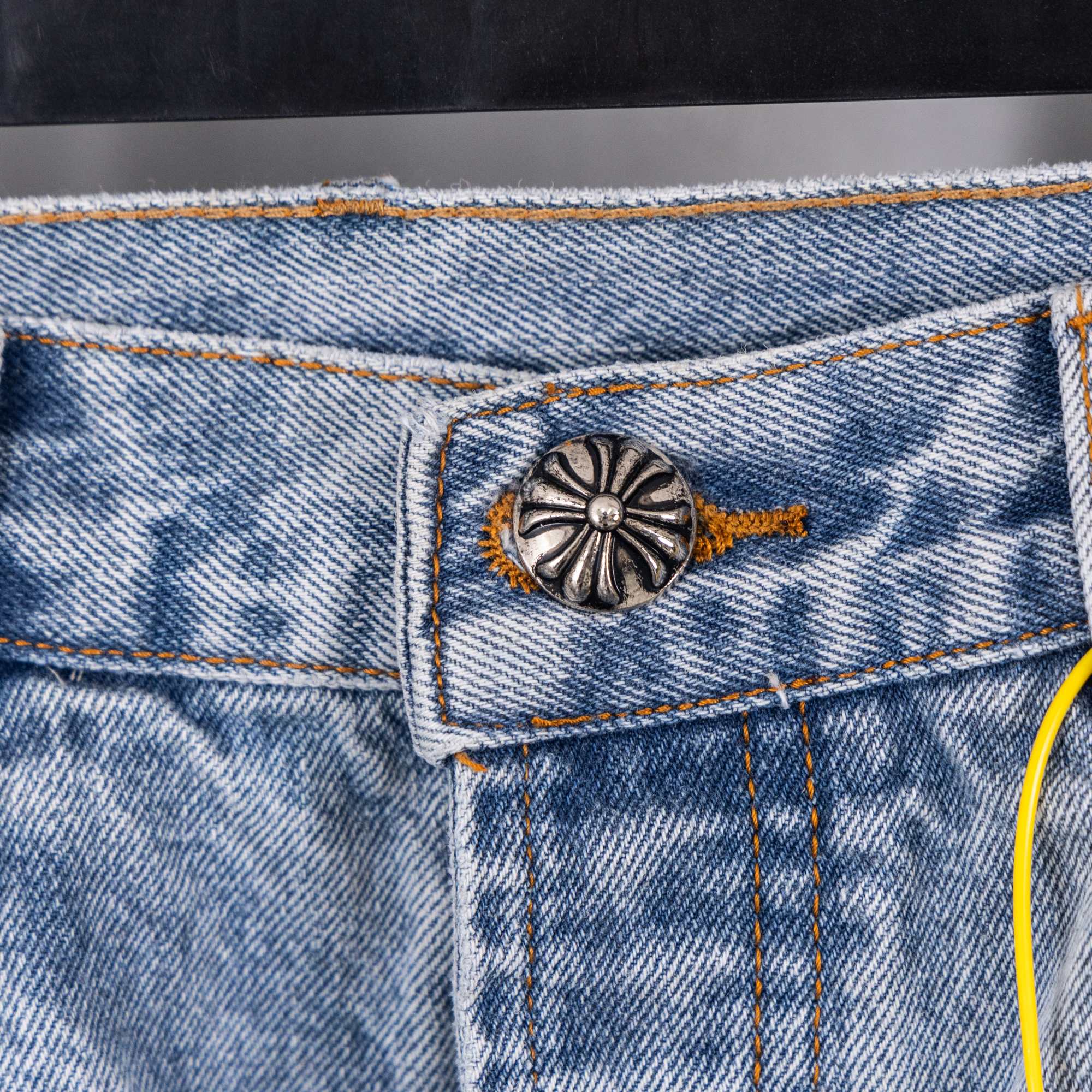 Chrome pants denim pocket with decorative metal button and stitch details