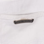 White denim pants with chrome logo metal tag detail