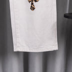 White denim pants hem with stitched seam detail
