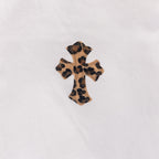 Leopard-print cross patch on white denim