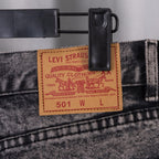 Levi Strauss leather patch on dark gray denim jeans waistband