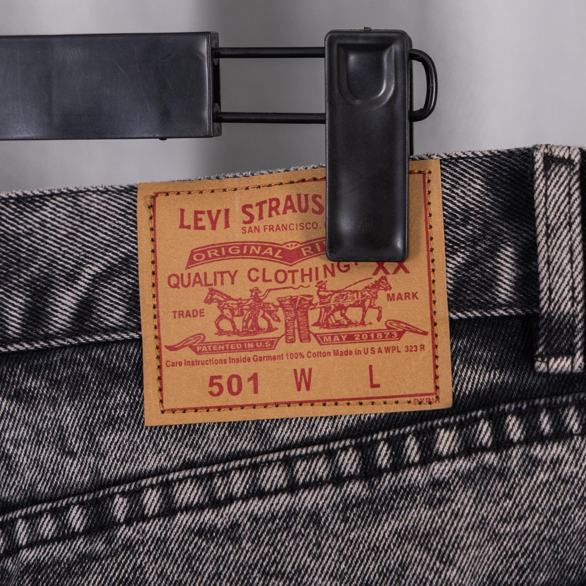 Levi Strauss leather patch on dark gray denim jeans waistband