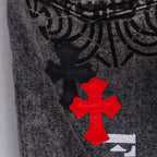 Dark gray denim jeans with black cross patch and red cross overlay graphic