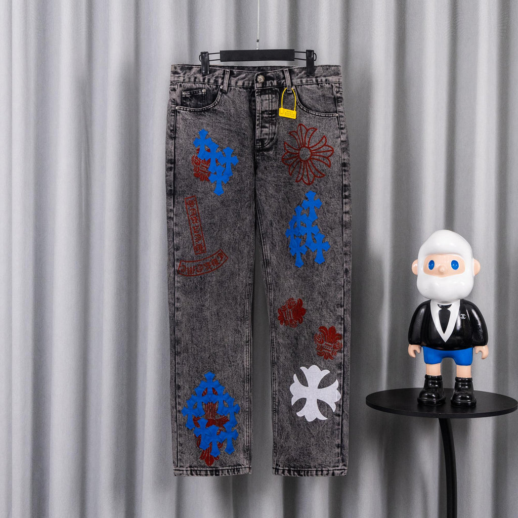 Dark gray denim pants with colorful graphic patches on legs