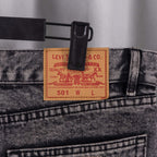 Levi's size label on dark denim waistband with stitched belt loop
