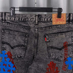 Dark gray denim pants with front pockets and Levi's 501 label