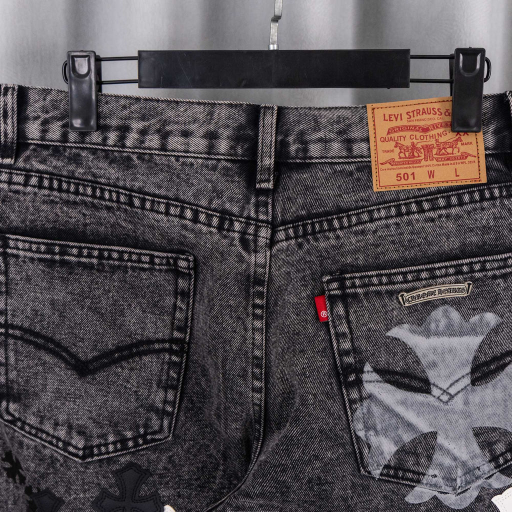 Dark denim pants with waistband Levi Strauss label and pocket graphic