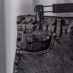 Dark denim pants front pocket with rivet button and stitched waistband