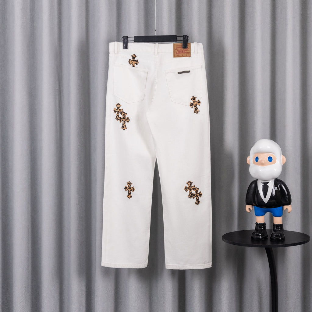 White pants with leopard-print cross patch details and back-pocket design