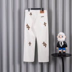 White pants with leopard-print cross patch details and back-pocket design