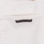 White denim pants with metal brand tab on front pocket