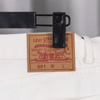 White denim pants with Levi Strauss size label at waistband