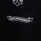 Black T-shirt with embroidered white ribbon logo text under the cross graphic