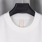 White crew-neck T-shirt with round neckline close-up