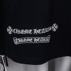 Black short-sleeve shirt with white embroidered emblem and banner text