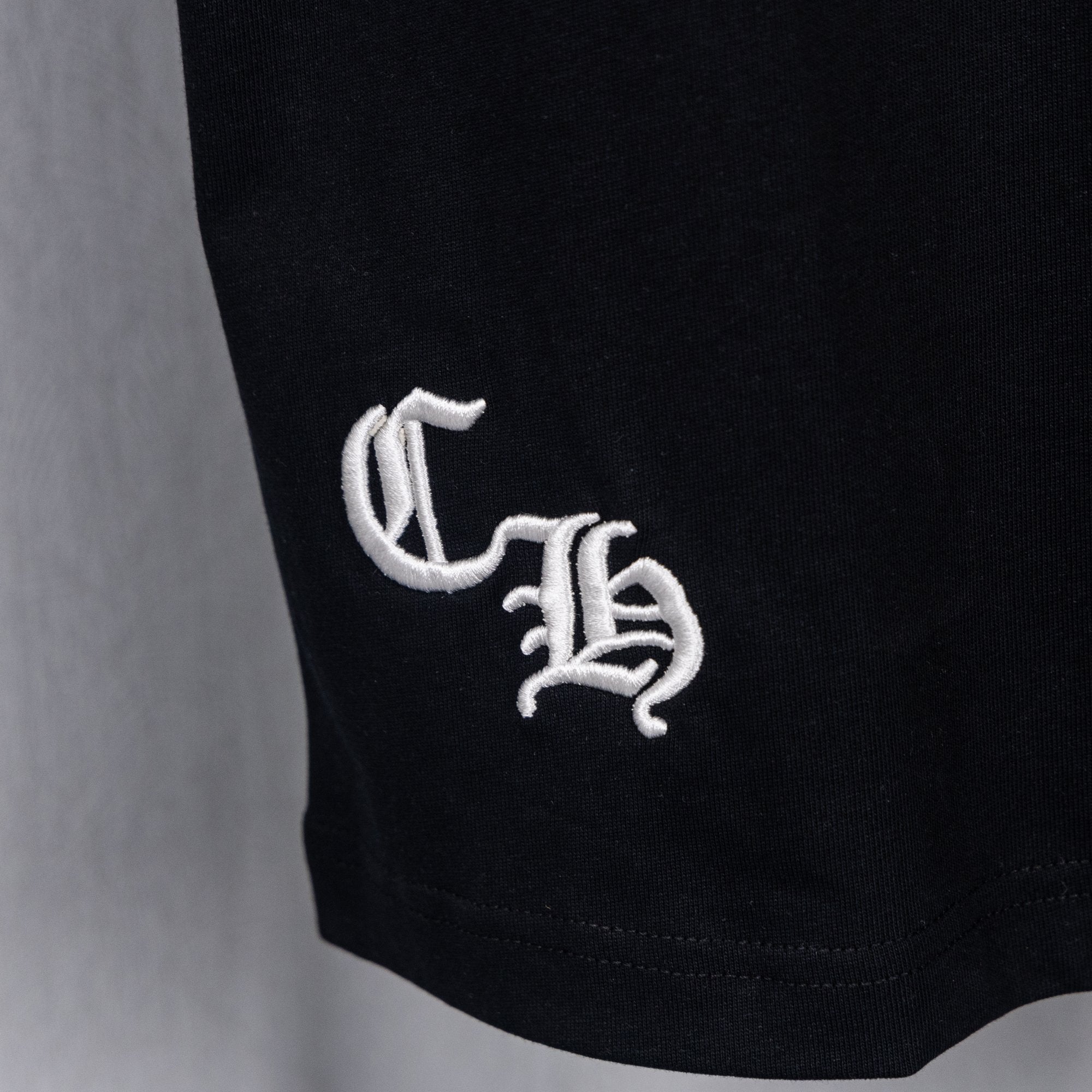 Chrome short shirt, black with white embroidered script logo