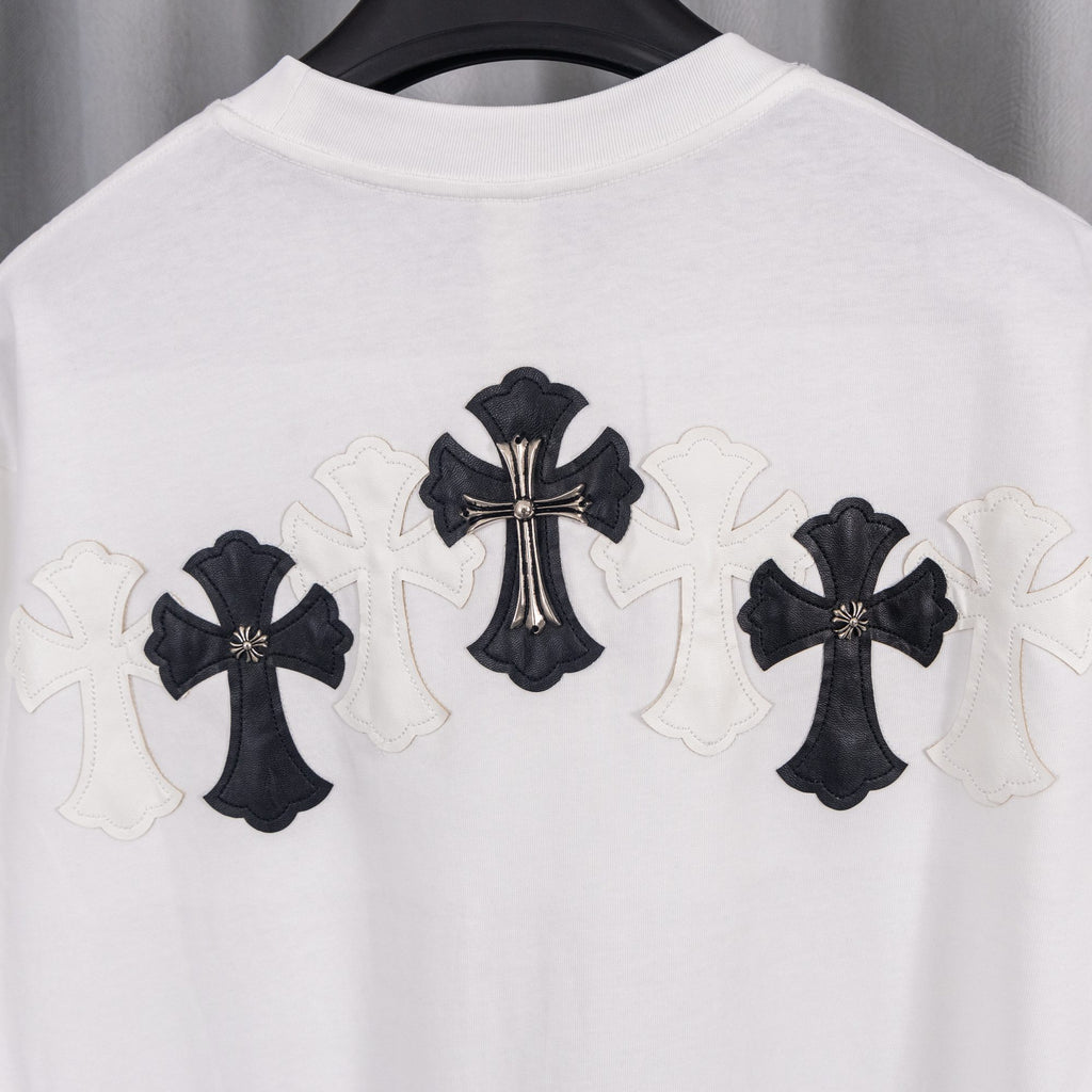 White T-shirt back with central black cross applique and three cross motifs