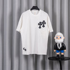 White short-sleeve T-shirt with black cross appliques on chest and sleeves