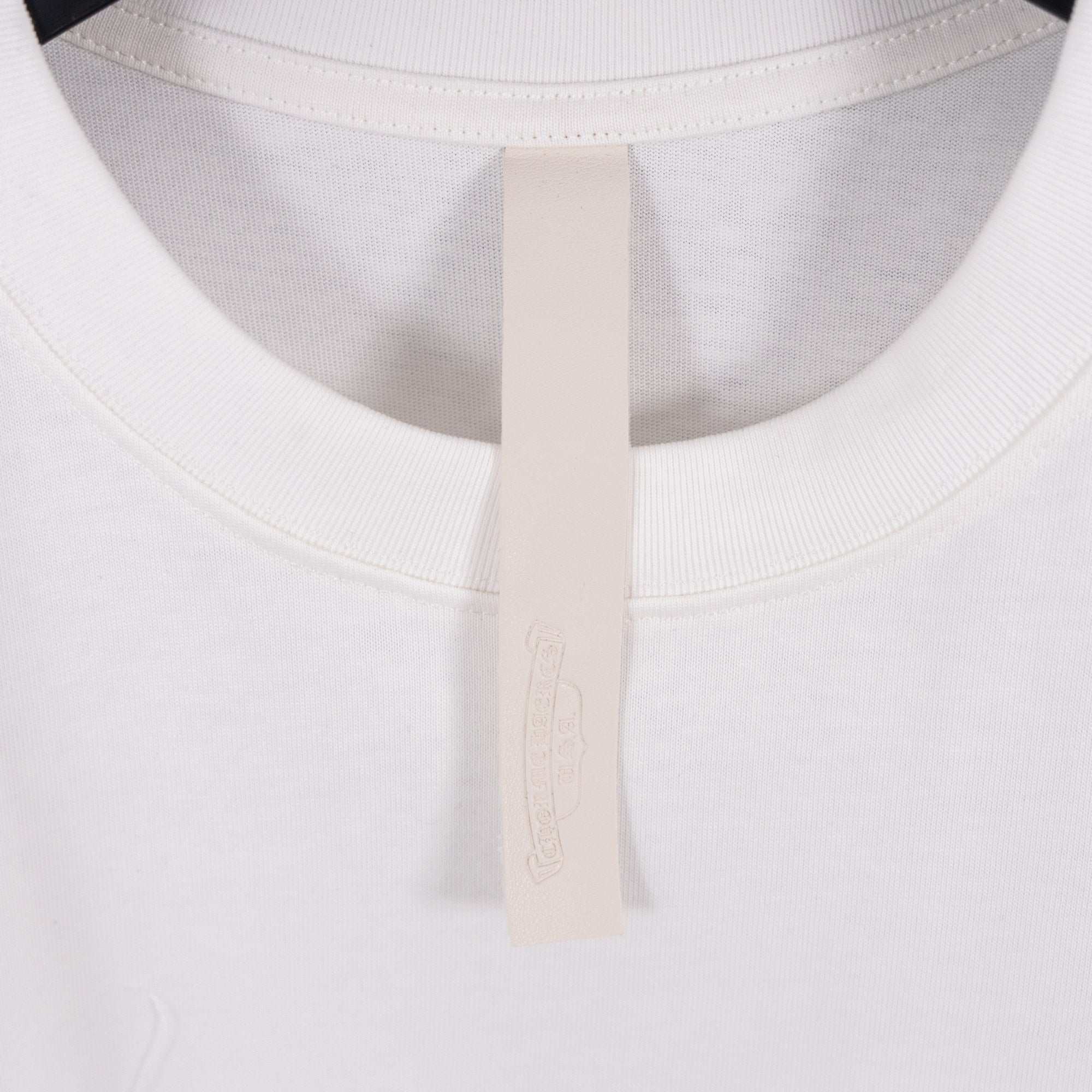 White short-sleeve shirt neckline and crew collar