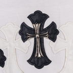 White short-sleeve shirt with black cross graphic applique