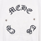 White T-shirt with dark decorative emblem panel and symbols