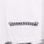 White T-shirt with dark horizontal logo patch on lower front