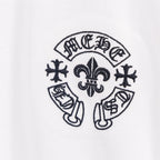 White T-shirt with dark circular fleur-de-lis emblem print