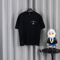 Black crewneck short-sleeve T-shirt with small chest graphic print