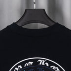 Black T-shirt back upper with partial circular emblem graphic