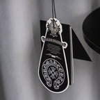 White and black hanging garment tag with circular logo print