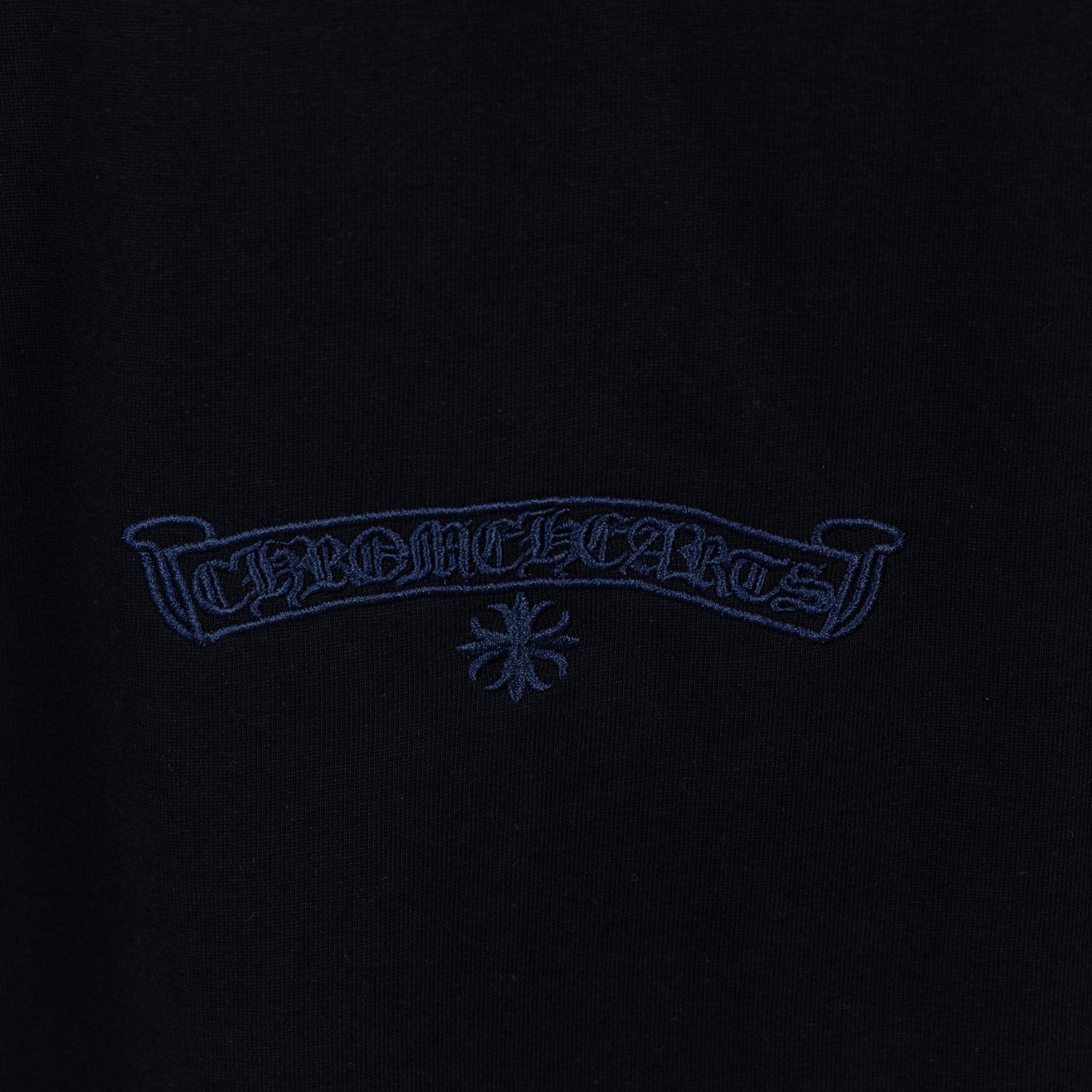 Black T-shirt small chest ribbon logo with starburst emblem