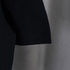 Black T-shirt hem with double-stitch seam detail