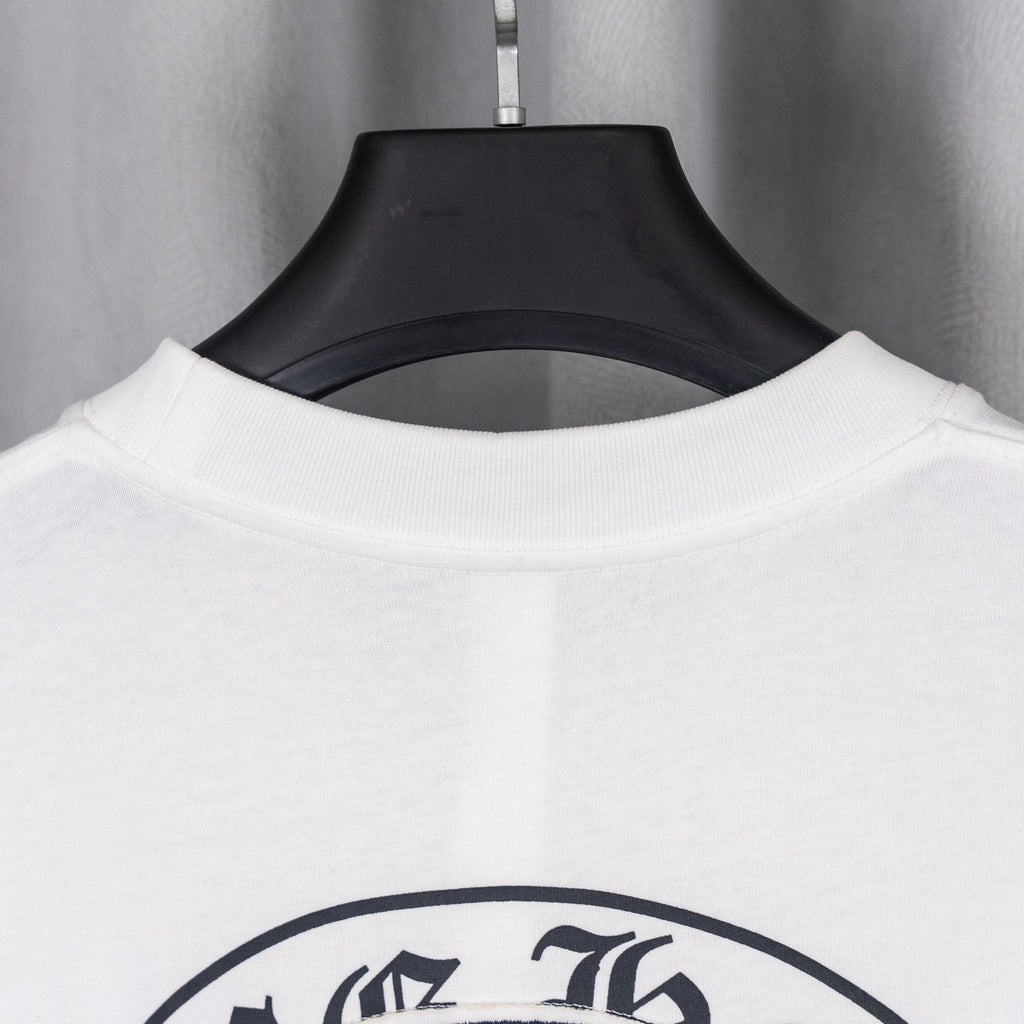 White T-shirt crew neckline ribbing with inside collar visible at back