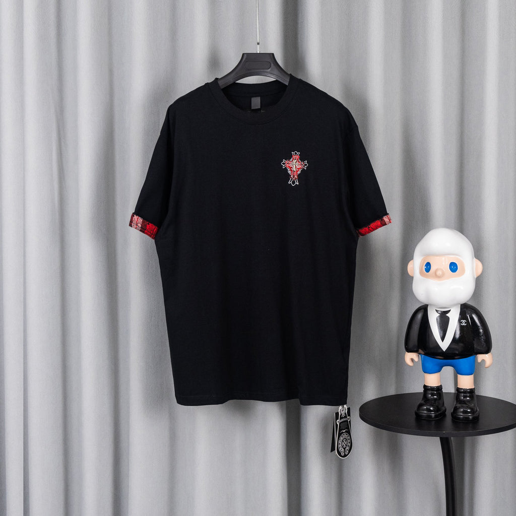 Black short-sleeve T-shirt with red trim cuffs and small chest graphic patch
